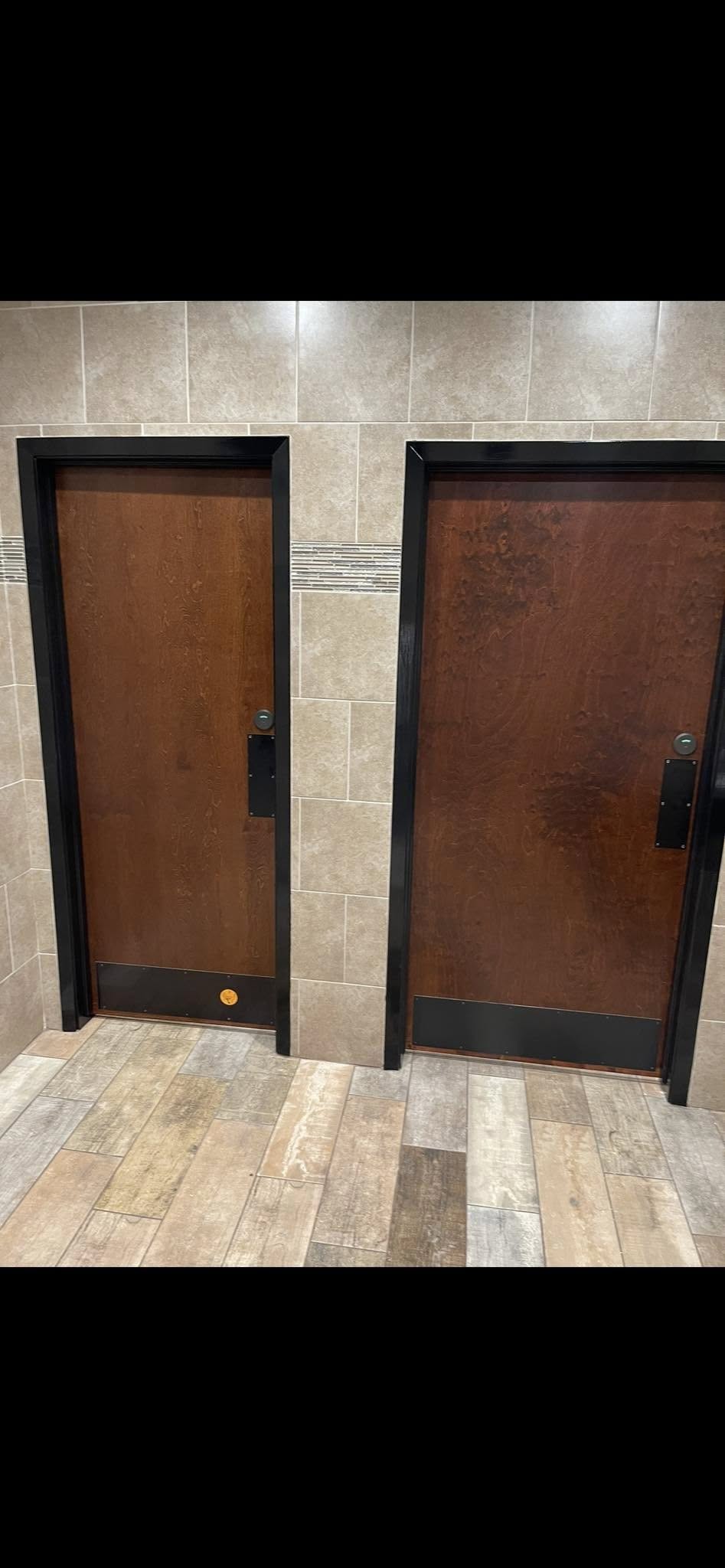 JNL Flooring bathroom installation with coordinated tiled walls and floors