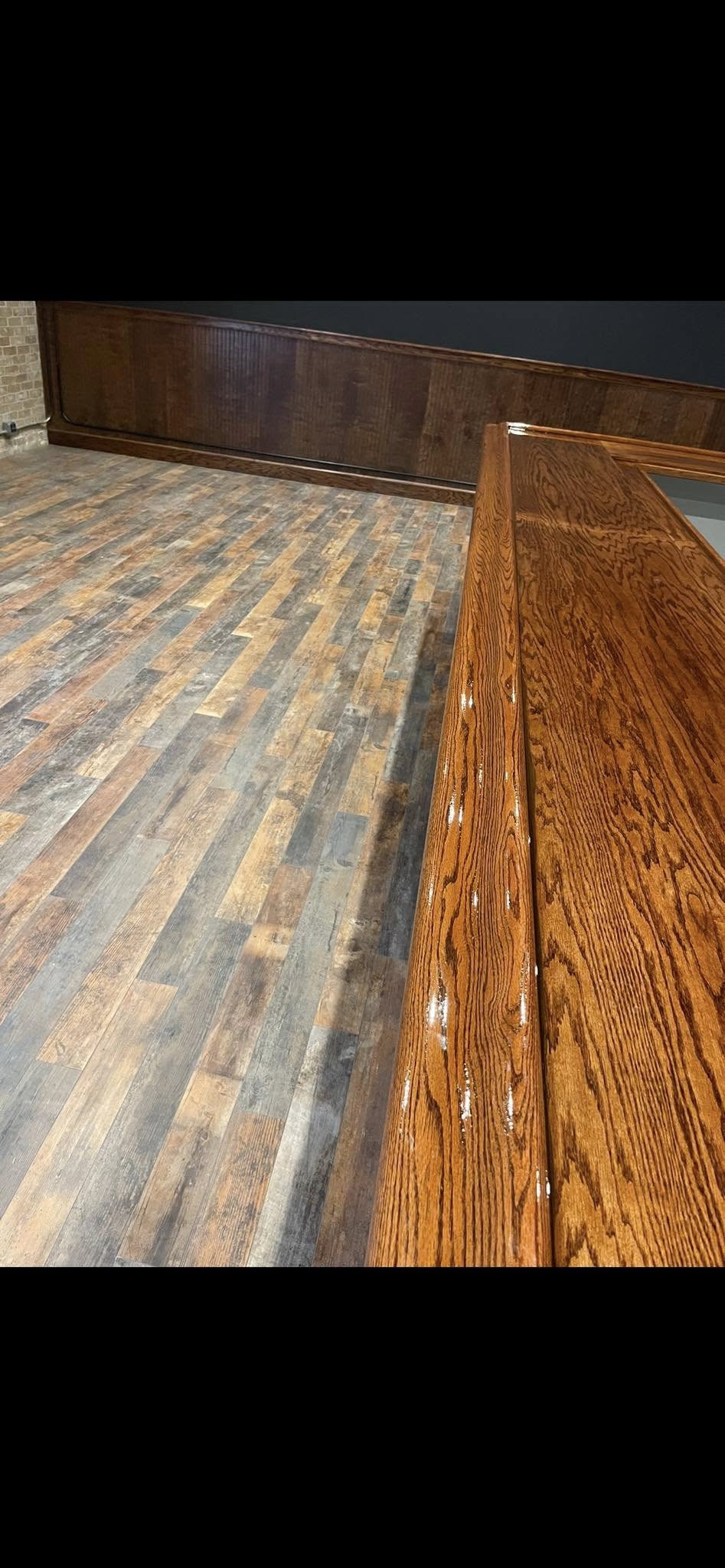 JNL Flooring wood-look luxury vinyl plank installation in a restaurant
